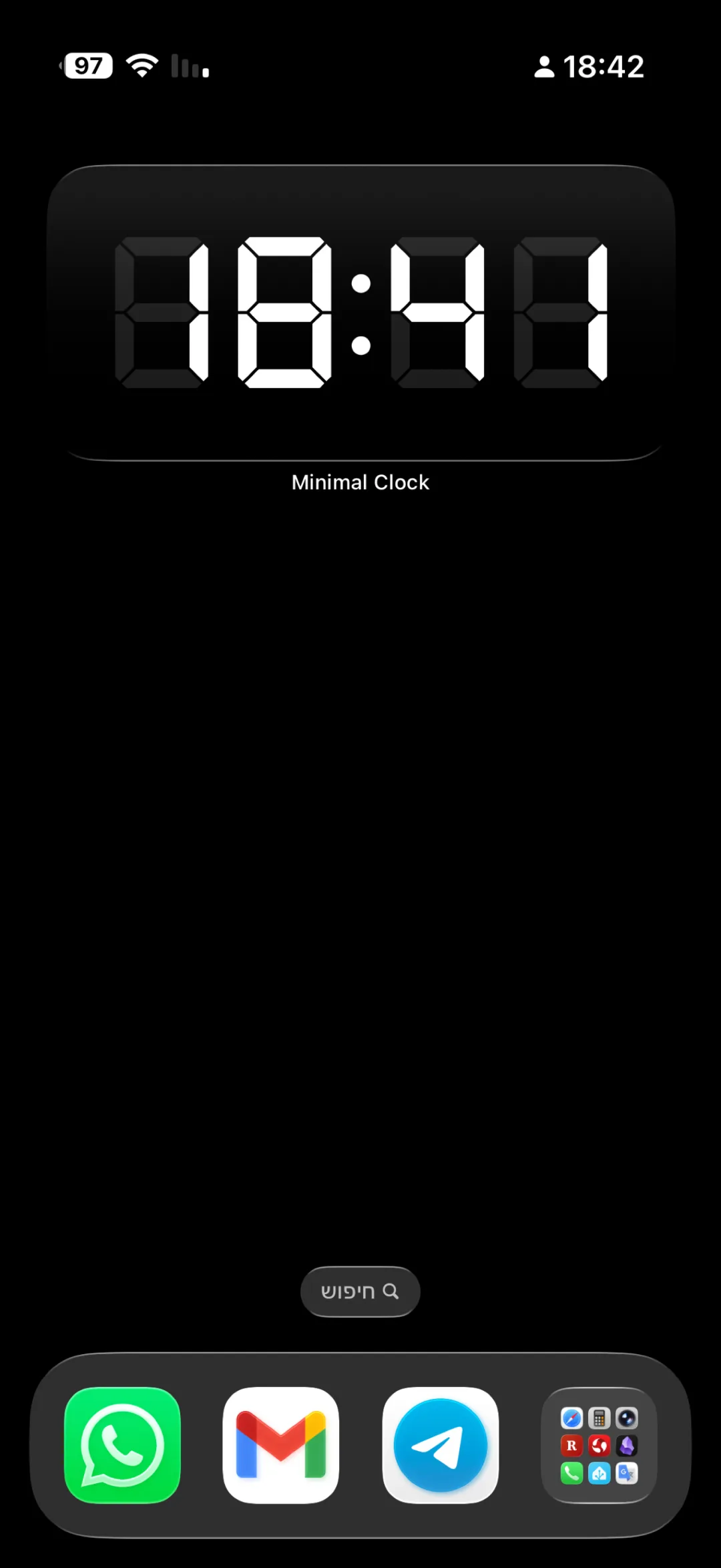 The 7-segment LCD clock in the Dark theme, the unlit ghost segments sitting faintly behind the lit digits.